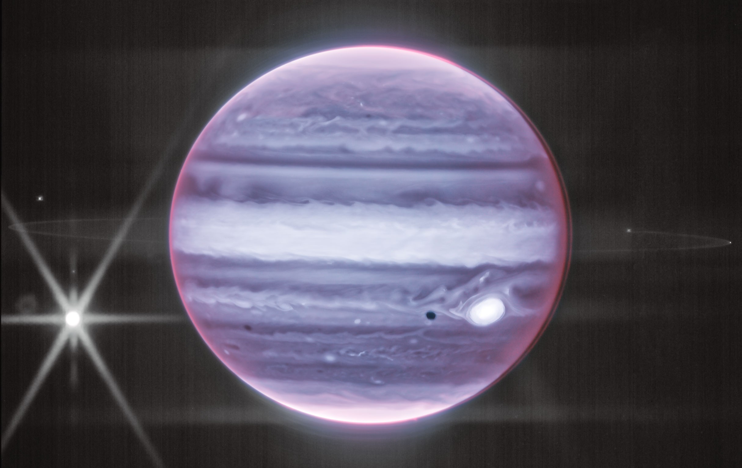 Uma imagem infravermelha de Júpiter e sua lua Europa tirada pelo Telescópio Espacial James Webb em julho.  Imagem = NASA/ESA/CSA/STScI, Processamento e Licenciamento = Judy Schmidt