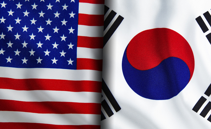 American and South Korean flags standing side by side