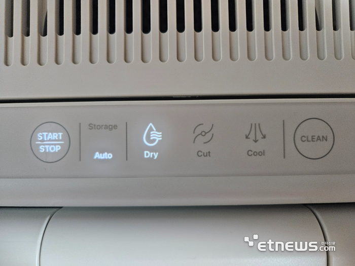 제품 상단의 상태 표시바. 음식물 무게를 자동 감지한 후 고온분쇄 처리를 하고 있다. (사진=배옥진)