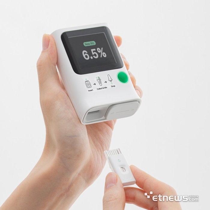 “5분 만에 당화혈색소 측정”…오렌지바이오메드, 세계 최초 휴대용 측정기로 美 FDA 도전장