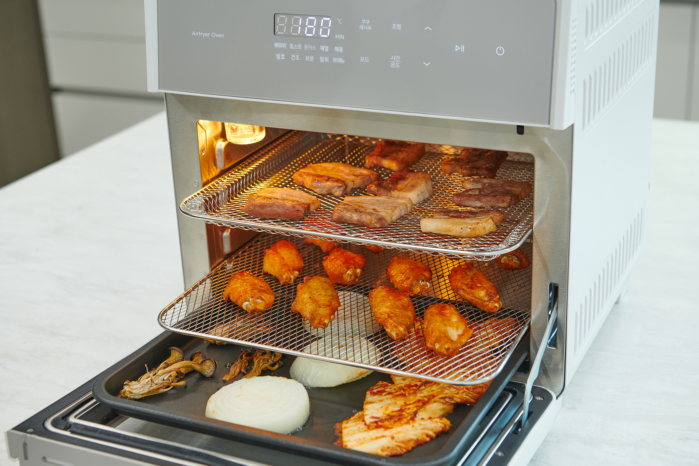 쿠쿠, '올 스텐·밀폐 구조' 에어프라이어 출시…온라인 시장 공략 강화