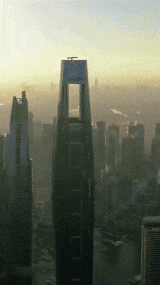 지난 22일 아랍에미리트 수도 두바이에 있는 시엘 두바이 마리나 호텔에서 선보인 에어쇼. 선두 선수가 호텔 상층에 있는 바늘귀를 통과하고 있다. 사진=엑스두바이