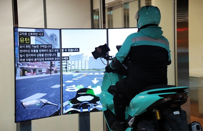 우아한청년들 배민라이더스쿨 가상현실(VR) 시뮬레이터 안전교육 〈자료 우아한청년들〉