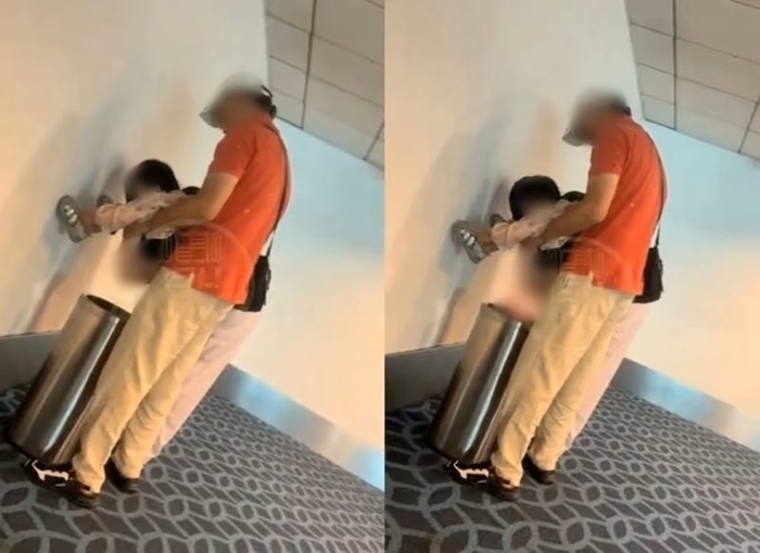 말레이시아 한 공항서 쓰레기통에 아이 용변을 보게하고 있는 민폐 부모. 사진=스레드 갈무리