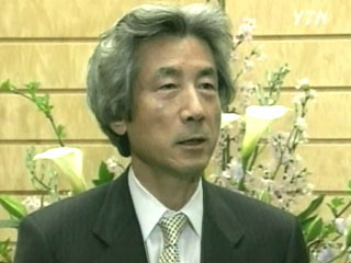 고이즈미 총리 “우정공사 민영화 연기 검토”