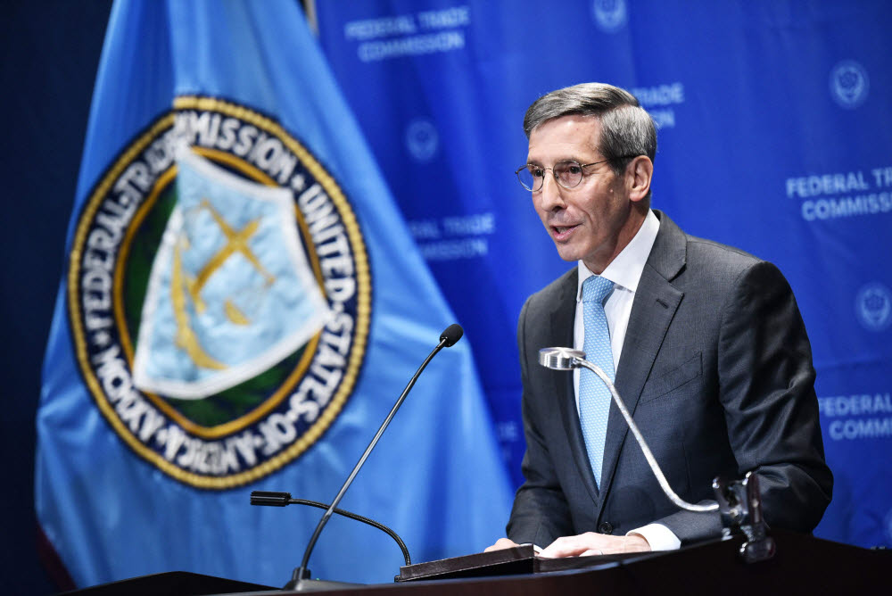 (FILES) In this file photo taken on September 4, 2019 Federal Trade Commission (FTC) Chairman Joe Simon speaks during a press conference at the FTC headquarters in Washington, DC. - A US regulatory agency said February 11, 2020it would review acquisitions made by five Big Tech firms for potential antitrust implications.The announcement by the US Federal Trade Commission opens the door to possible investigations of deals made by Amazon, Apple, Facebook, Microsoft and Google parent Alphabet since 2010.The FTC said in a statement it ordered the five firms "to provide information about prior acquisitions not reported to the antitrust agencies" between January 1, 2010 and December 31, 2019. "This initiative will enable the Commission to take a closer look at acquisitions in this important sector, and also to evaluate whether the federal agencies are getting adequate notice of transactions that might harm competition," said FTC chairman Joe Simons. (Photo by MANDEL NGAN / AFP)